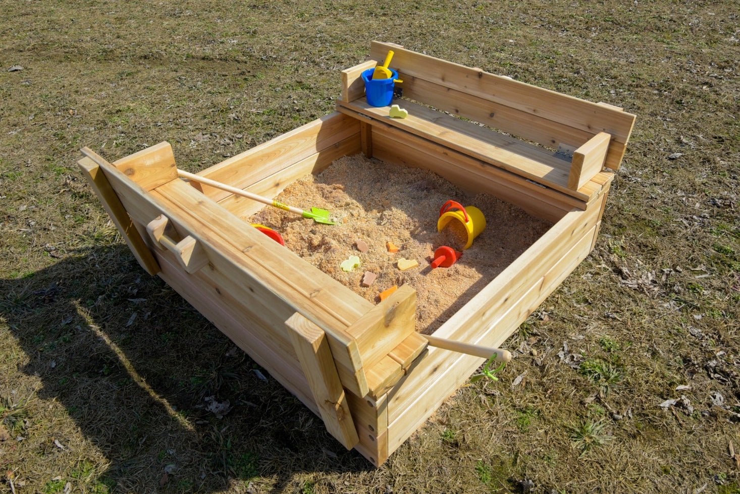 Sandbox with Benches by Naturally Inspired Play